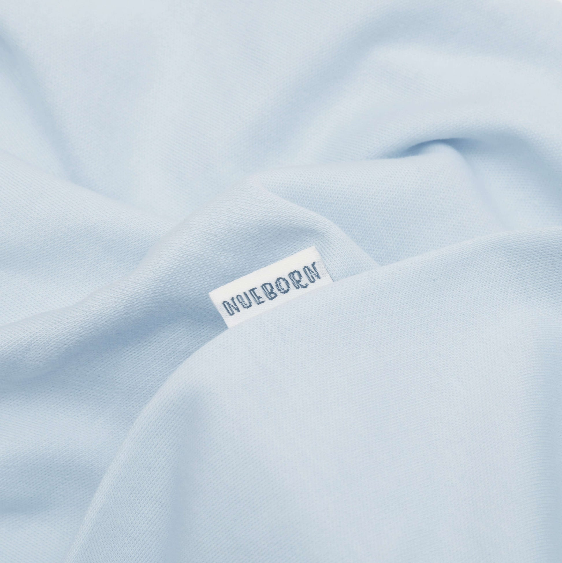 nueborn sleepsuit in Sky Blue