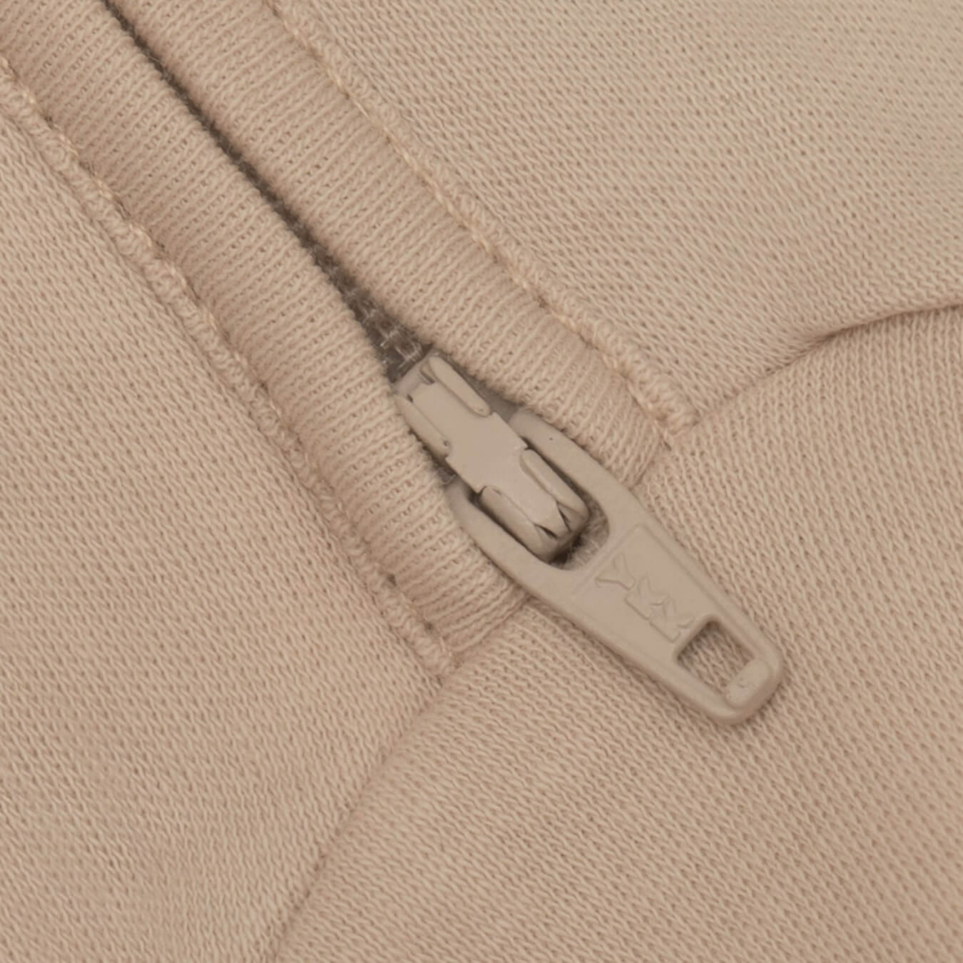 nueborn sleepsuit in Sandstone