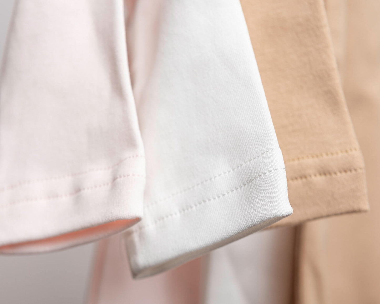 Close up range of nueborn double zip sleepsuits