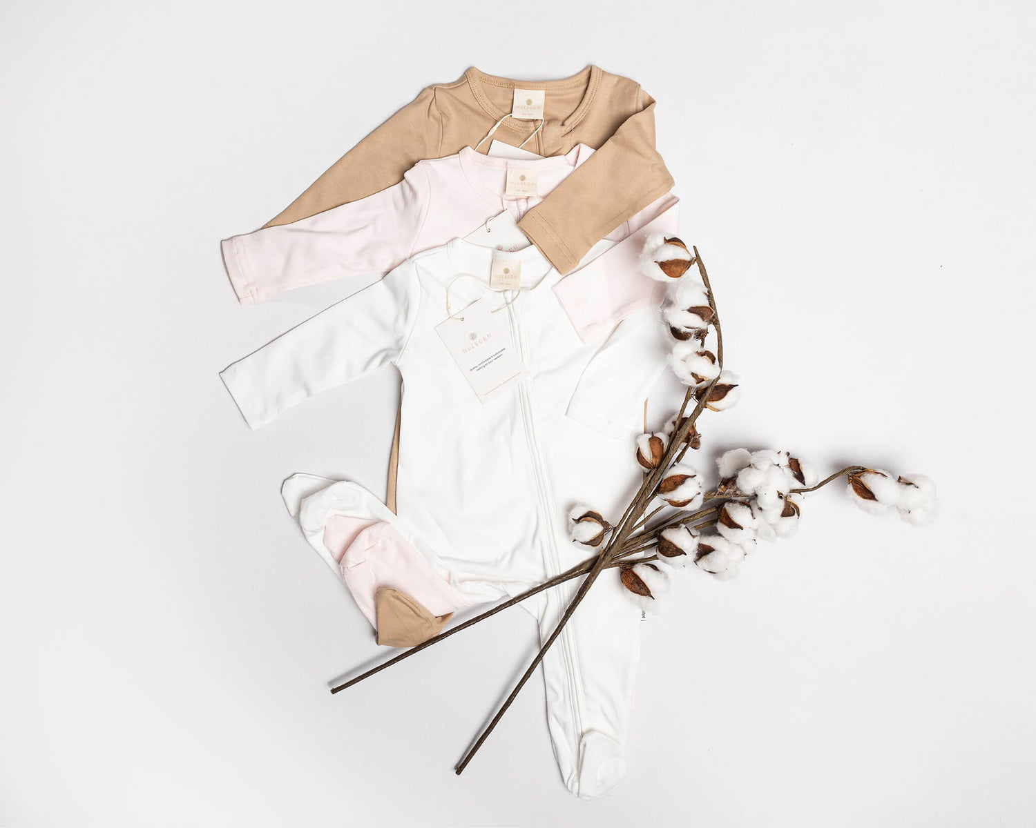 organic cotton clothing with a cotton branch
